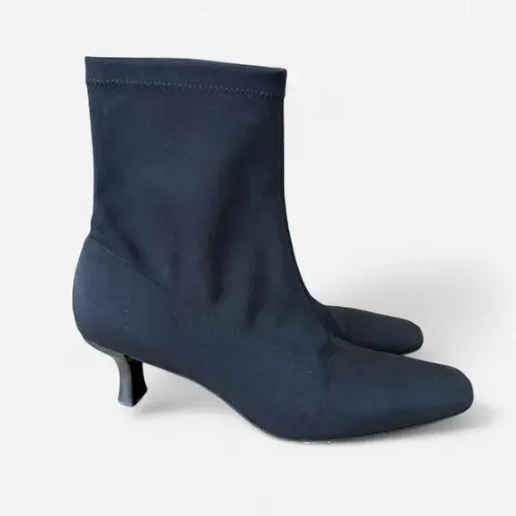 Black ankle sock boots with a kitten heel