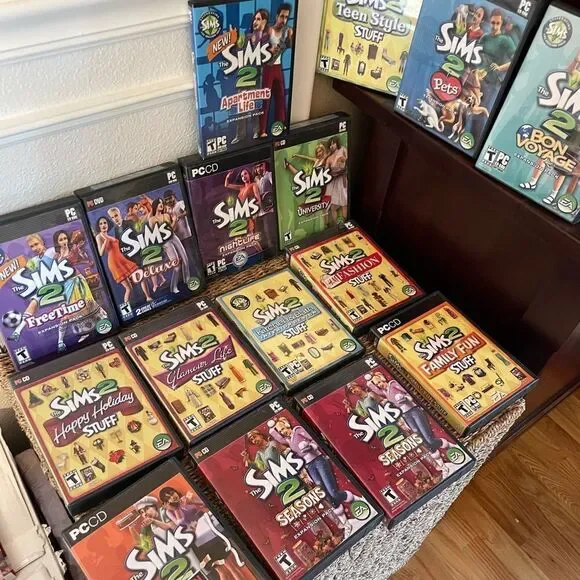 The SIMS PlayStation Vintage Side Video Game Lot PC DVD Pets Family Delux Sets