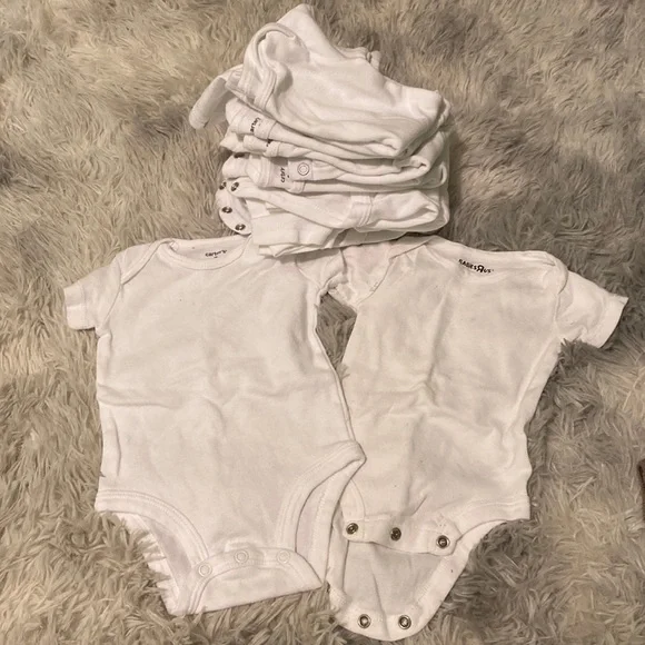 Bundle of 11 white short sleeved onesies
