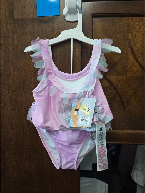 Brand new 9/10 girls swimsuit from the disney store item 1029