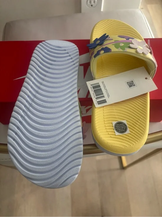 Nike Kids Yellow Floral Slide Sandals with Multicolor Flower Accents