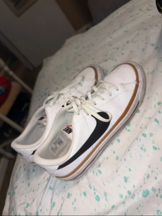 Nike White Leather Sneakers with Black Swoosh and Gum Trim