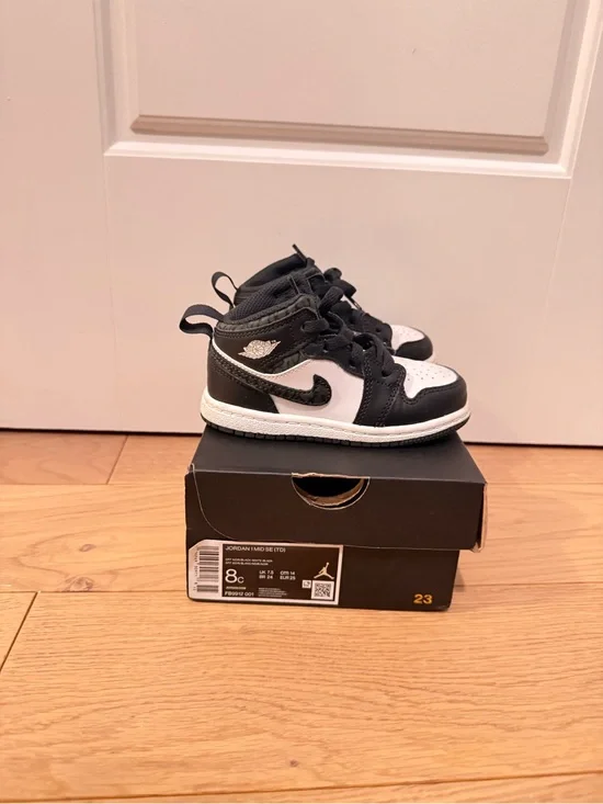 Black and White Kids Nike Sneakers