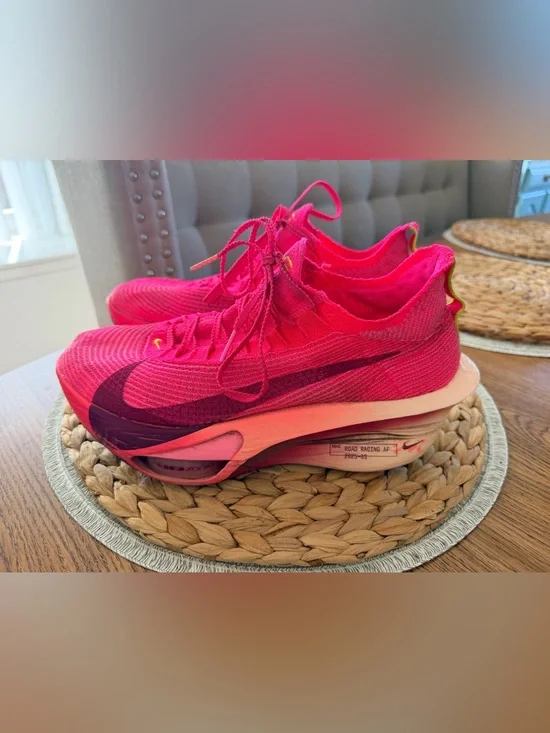 Nike Women's Hot Pink Flyknit Road Racing Shoes