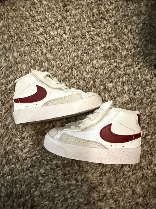 Nike Kids White High-Top Sneakers with Red Swoosh
