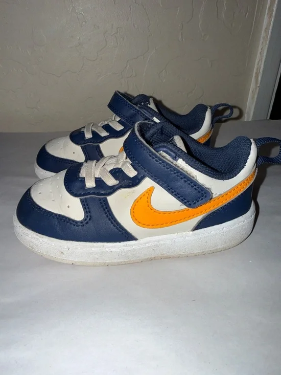 Nike court borough low top blue and orange toddler size 8.