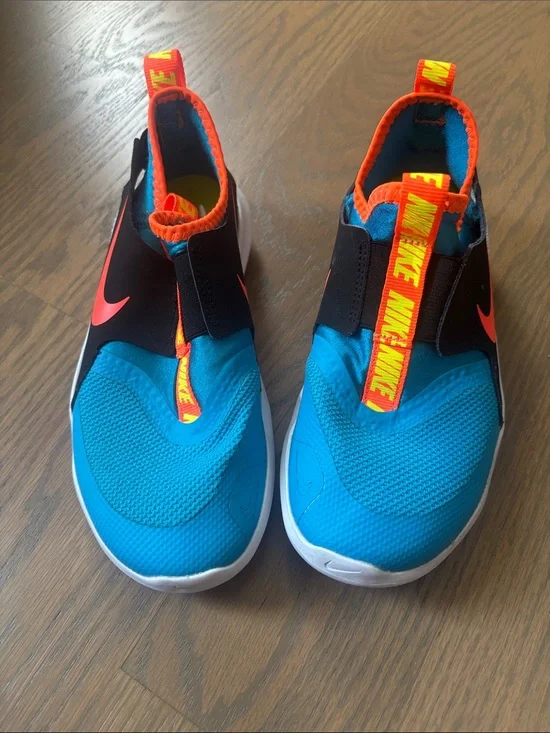Nike Kids Slip-On Sneakers in Bright Blue with Orange Accents