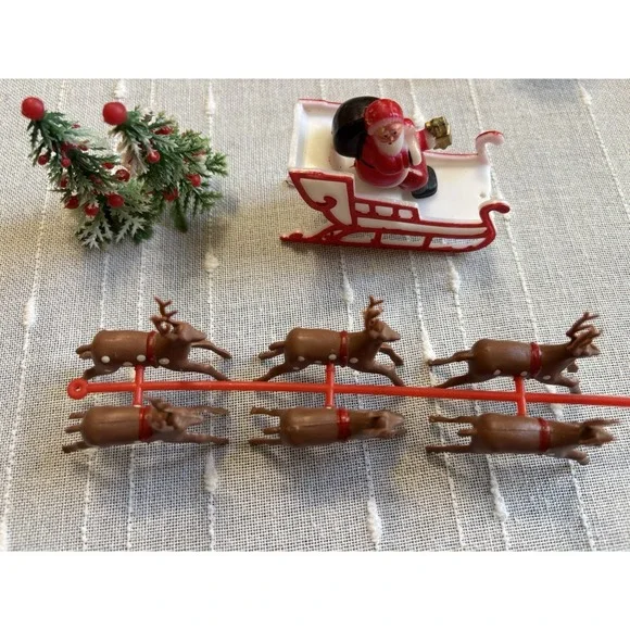 Vintage Look Miniature Plastic Santa in His Sleigh with Reindeer Cake Topper