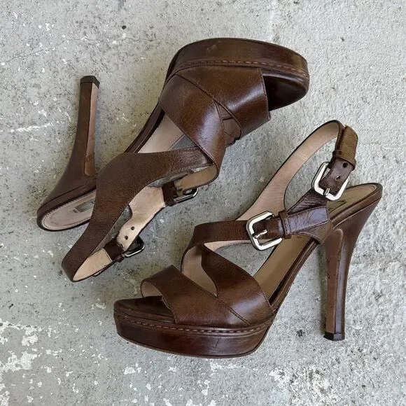 Prada crisscross open toe platforms