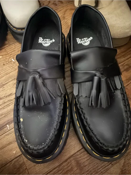 Dr. Martens Black Tassel Kiltie Loafers with Yellow Welt Stitching