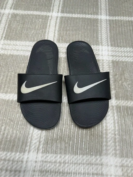 Nike Black Slides with White Swoosh Logo