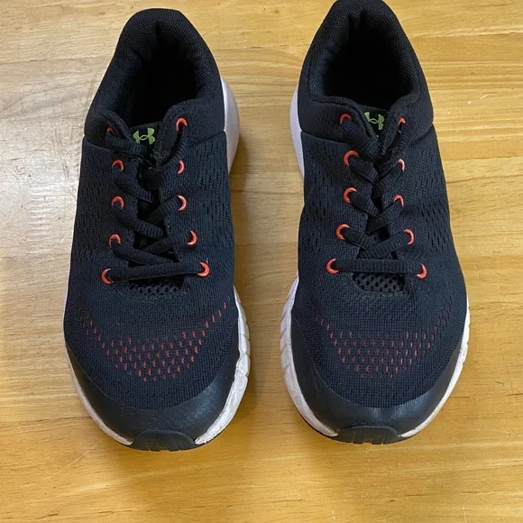 Under Armour Kids' Black Athletic Sneakers with Orange Accents