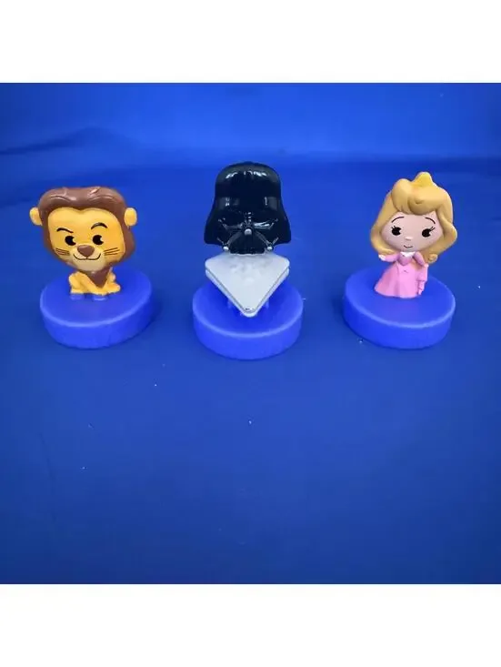 3 Figures McDonald's Happy Meals, celebrating Disneyland's 70th anniversary