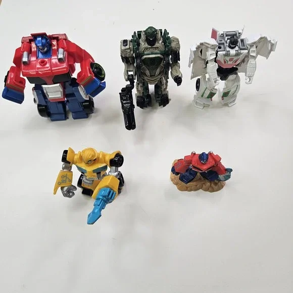 Lot of 5 Transformers Action Figures - Optimus Prime, Bumblebee & More