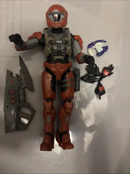 Red and Gray Interchangeable Action Figure with Weapons and Hands