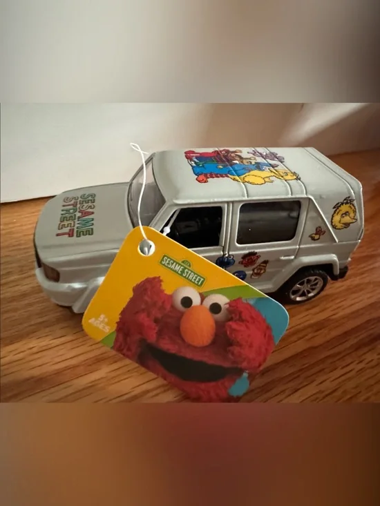Sesame Street Silver Mini Van with Colorful Character Art doors open NEW w tags