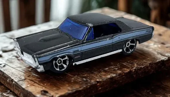 Hot Wheels 1965 Pontiac GTO Diecast Car Metallic Black Blue Windows Muscle
