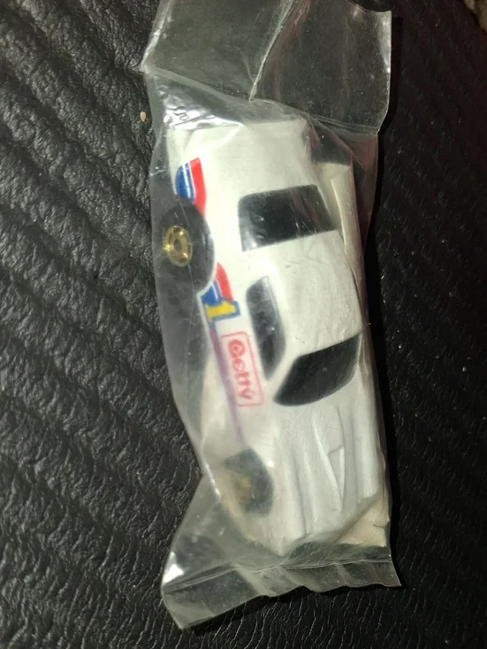 Vintage 1982 Getty Mattel White Race Car Toy with Red and Blue Stripes