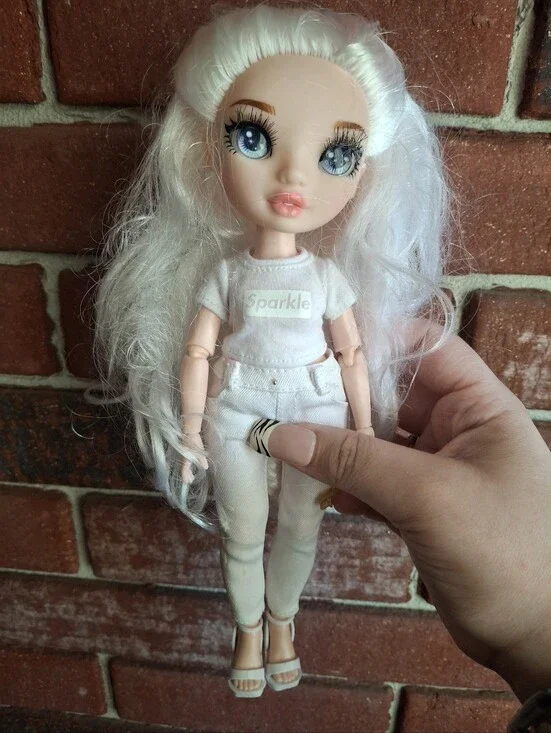 Rainbow high doll with white hair and blue eyes