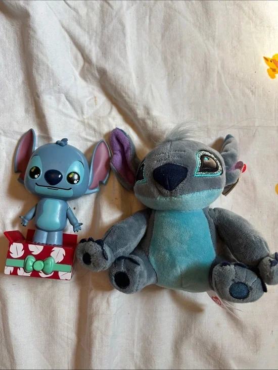 Stitch pop up toy and a stitch stuffed animal 5.5”- 7”