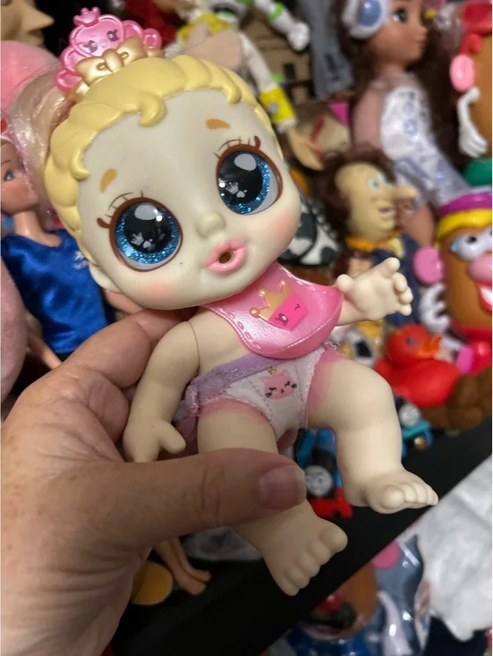 Cute Baby Doll with Blonde Hair and Big Blue Eyes