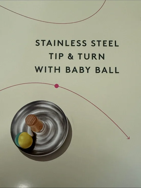 Lovevery stainless steel tip & turn with Yellow & Teal Ball