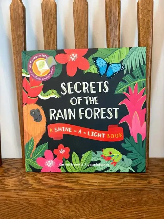 Secrets of the Rain Forest Shine-A-Light Book by Carron Brown