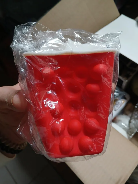 a Soda Clicker fidget toy or a similar 3D-printed accessory.