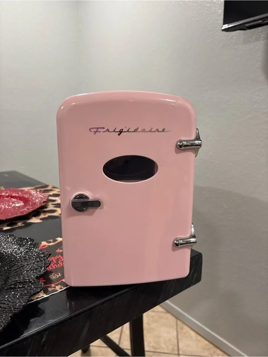 Frigidaire Pink Mini Fridge Cosmetic Cooler or beverages Fits 6 cans.
