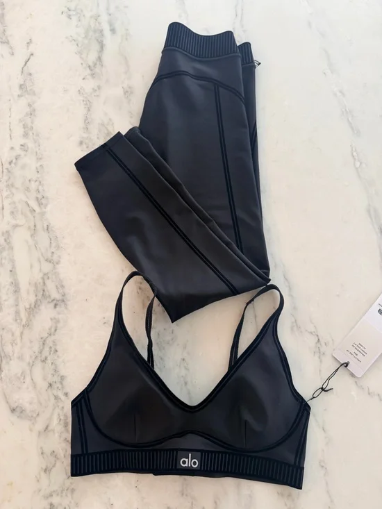 ALO Yoga Black Stripe-Trim Support Bra with matching leggings