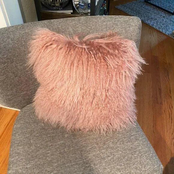 West Elm Mongolian Lamb pillow dusty pink