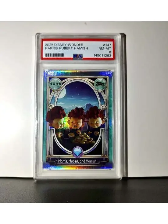 Harris, Hubert, and Hamish 2025 Topps Disney #147 Diamond Card Brave PSA 8
