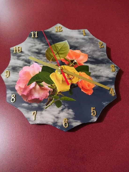 Yellow rose in the sky clock