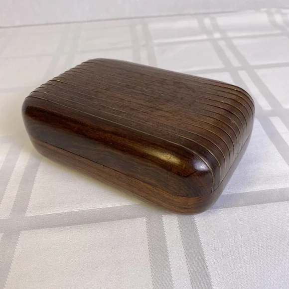 Hand‎ carved 2 piece wood box with metal hinge, hook and metal ribs on lid