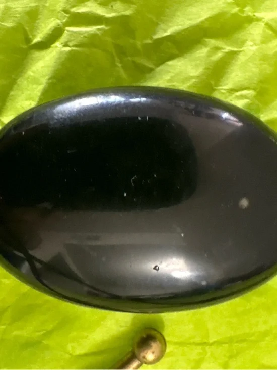 Sleek Black Oval Compact Bolo Tie