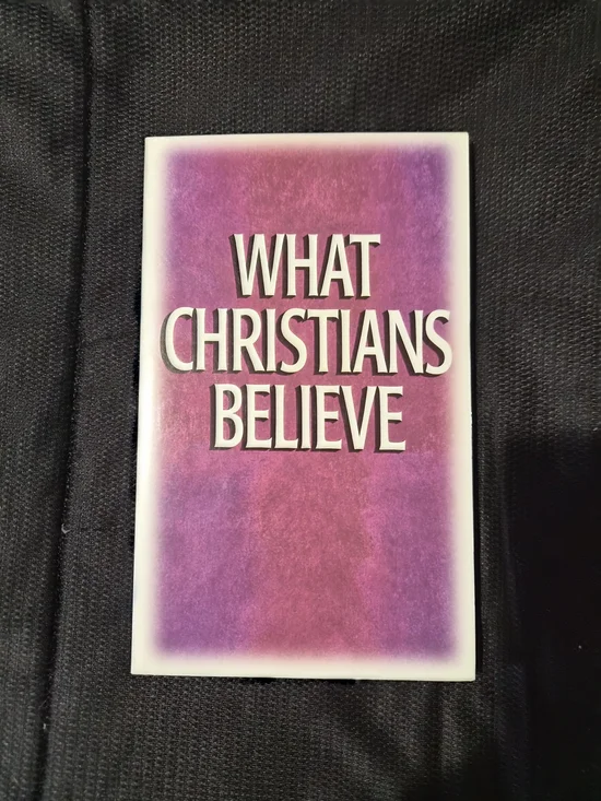 What Christians Believe Paperback Book - Pink/Purple Cover