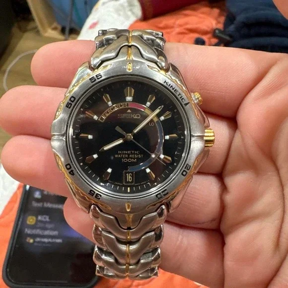 Seiko kinetic watch with gold and silver accents #watch #luxury Title: Vintag.