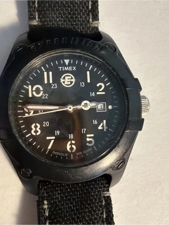 Timex Black Dial Field Watch with Black Canvas Strap not sure if it works