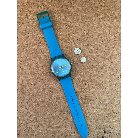 Swatch Blue Rebel SUON700 Day Date Blue Dial Silicone Strap Watch Vintage Swiss