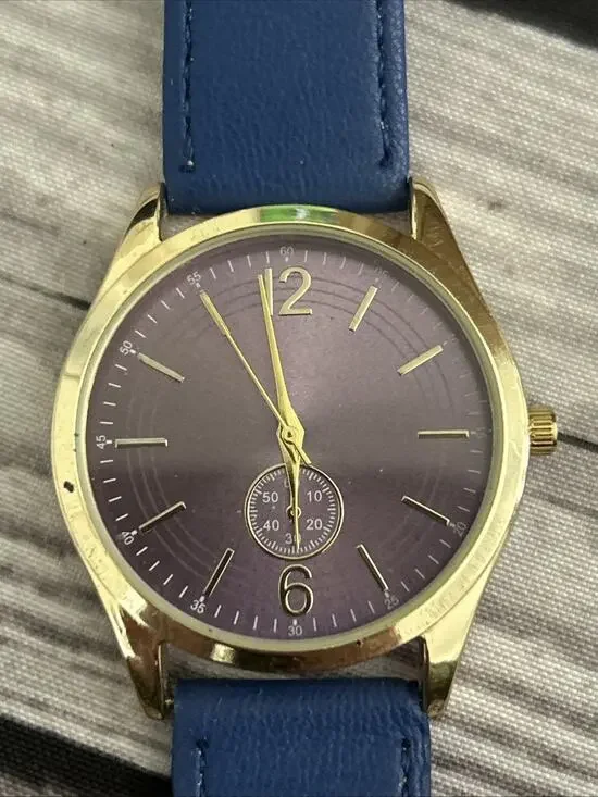 Gold Tone Case Purple Dial Blue Band Women’s Quartz Watch