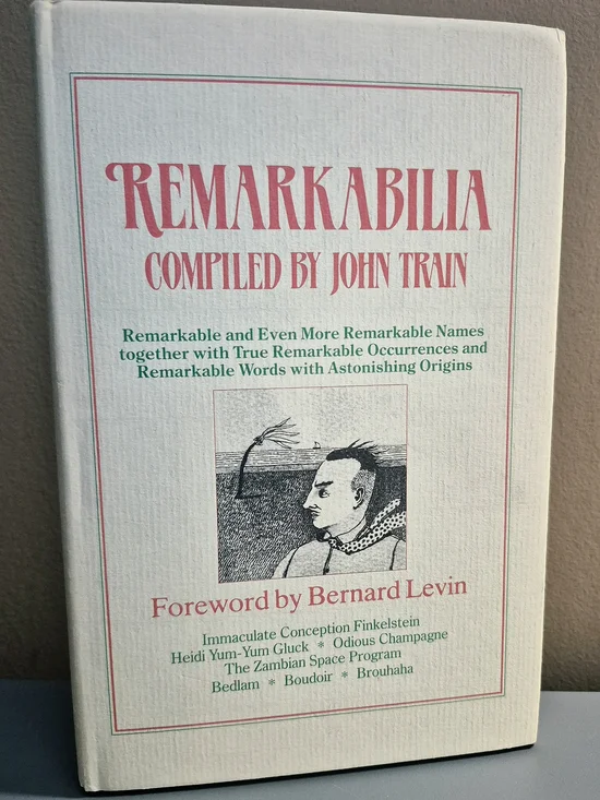 Remarkabilia compiled by John Train — Cream & Pink Hardcover Book
