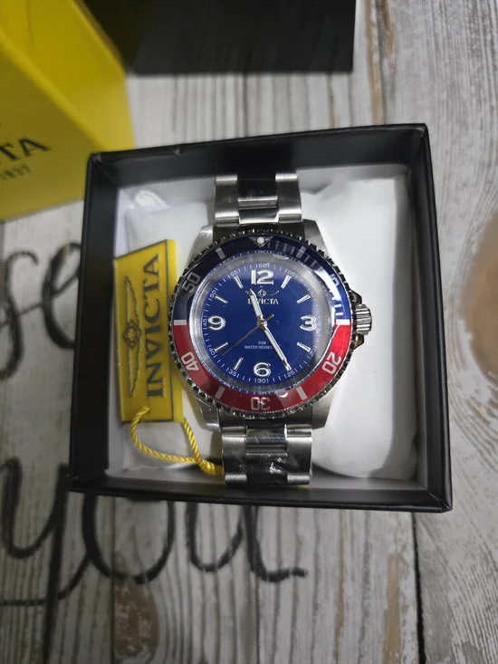 Invicta Blue Dial Watch with Red & Blue Bezel