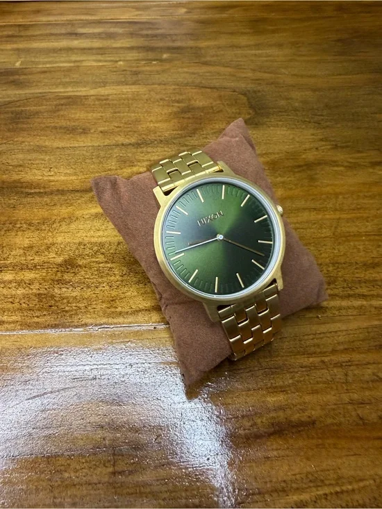 Nixon Gold Stainless Steel Watch with Green Dial