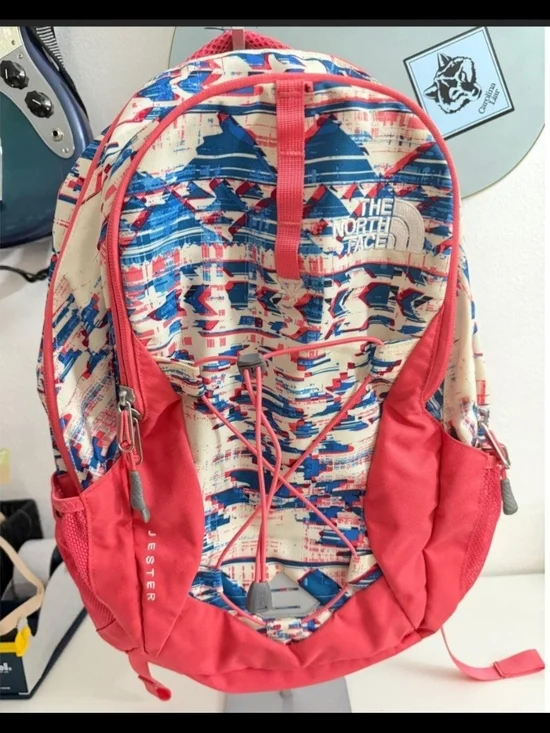 The North Face Patterned Jester Backpack in Coral and Blue