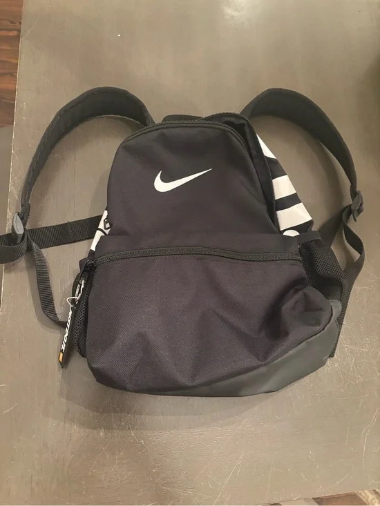 Nike Black Backpack with White Swoosh and Stripe Accents