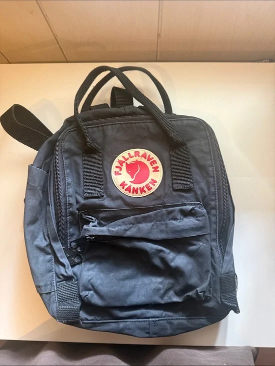 Fjallraven Kanken Mini Backpack in Black with Red Logo