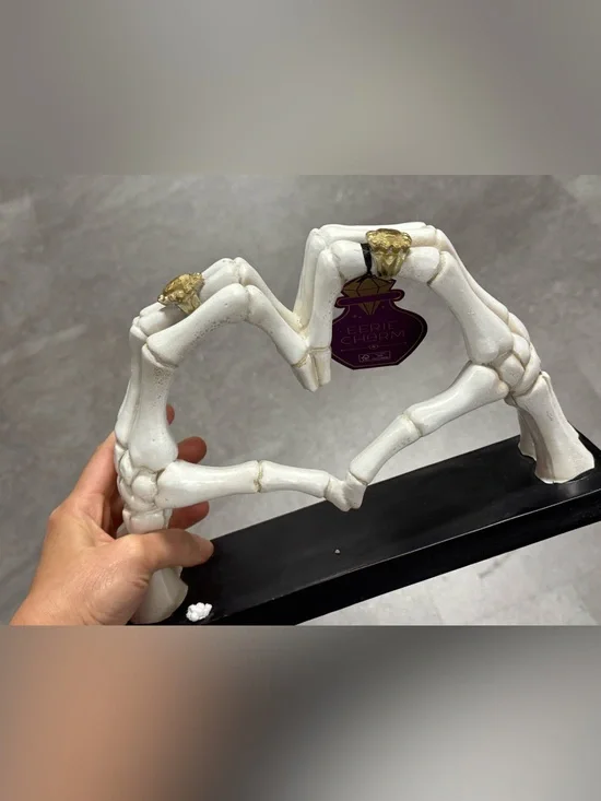White Skeleton Heart Accent with Gold Rings -