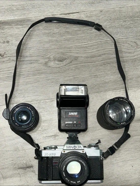 soVintage X-370 35mm Film Minolta Camera with Sakar Black Flash & Lenses Unteste