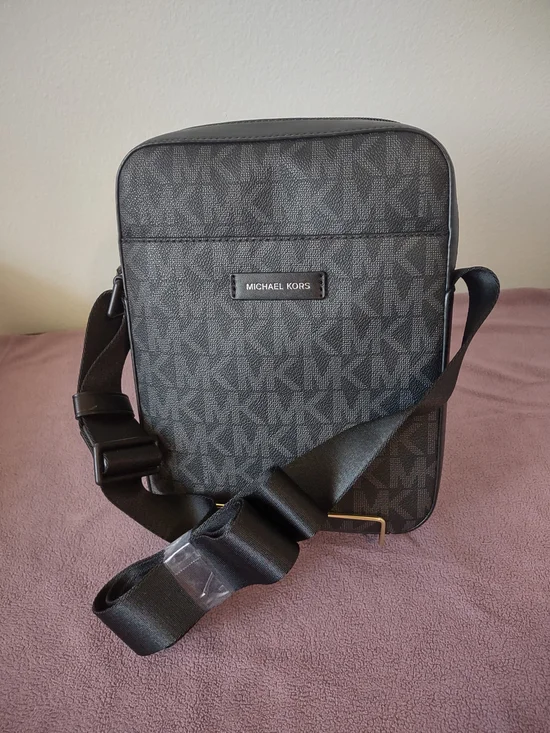 Michael Kors Jet Set Flight Crossbody Bag in classic black signature MK logo