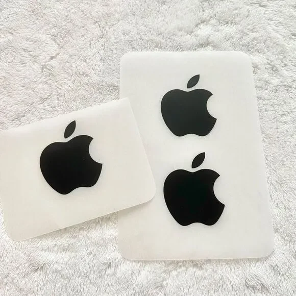 Set of three black apple stickers ￼